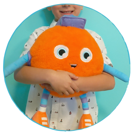 A child hugging a Watchum stuffy